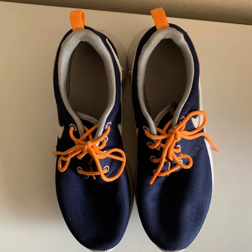 navy/orange nike roshe